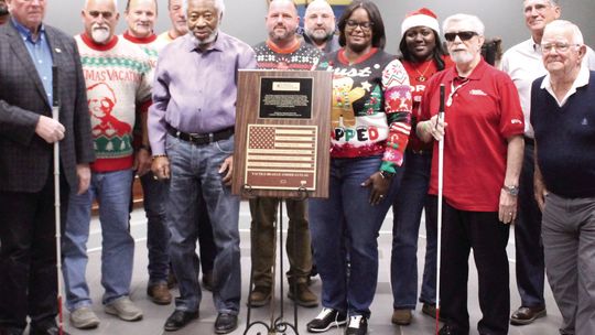 Blind veterans donate flag plaque to SMP government