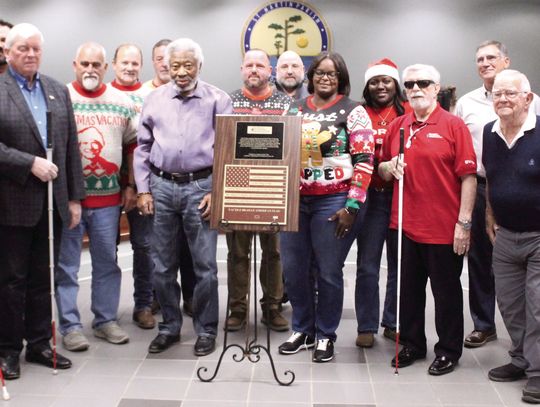 Blind veterans donate flag plaque to SMP government
