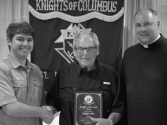 Knight of the Year - Freddy Foti (center) was honored as Knight of the Year by the St