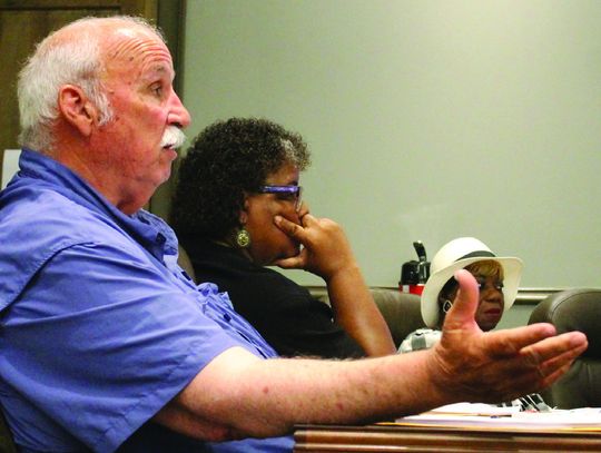 School board approves recommended budget cuts — with two exceptions