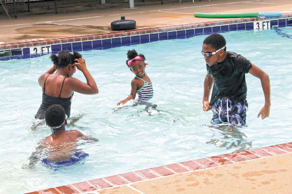 Kids hit swimming pool in St. Martinville for lessons, open swim Kids hit swimming pool in St. Martinville for lessons, open swim
