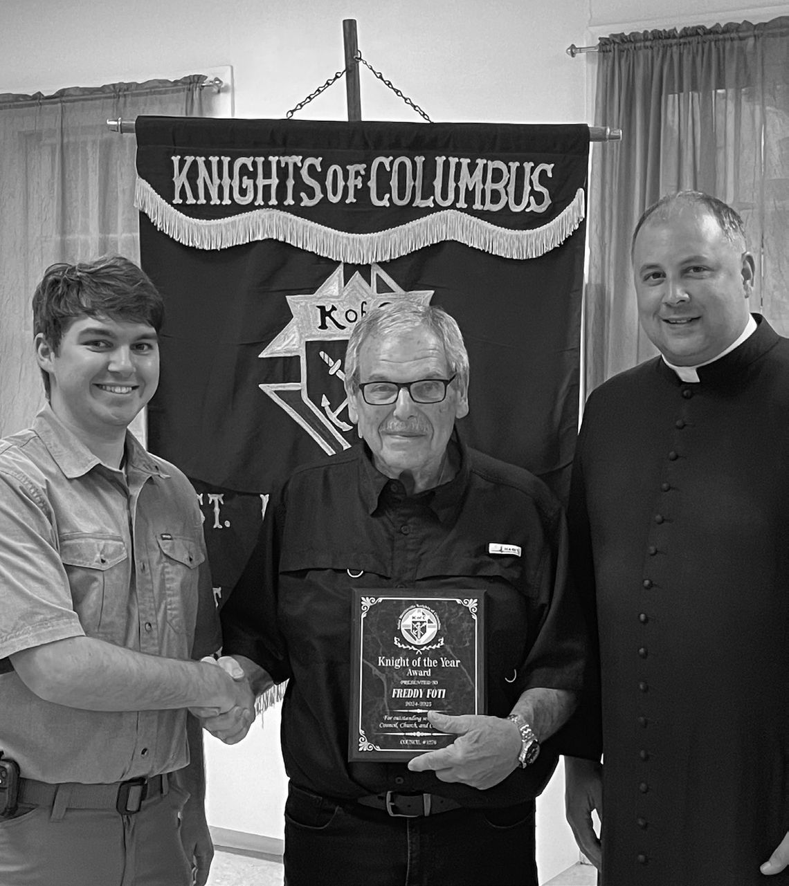 Knight of the Year - Freddy Foti (center) was honored as Knight of the Year by the St