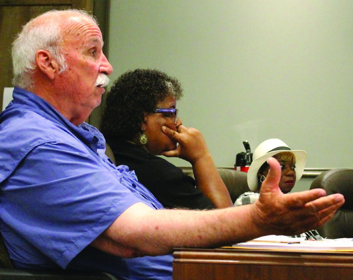 School board approves recommended budget cuts — with two exceptions