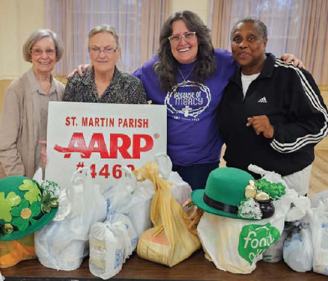 St. Martin Parish AARP Chapter #4460 held a food drive on March 12 for the Henderson Bible Church Food Pantry. Monetary donations were also received. Pictured from left, Barbara Bird, AARP Treasurer; Bonnie Ridley, AARP President; Lisa Trautwein, representative for Henderson Bible Church; and Liza Chance, AARP Vice President. (Submitted)